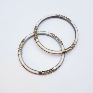 Elegant Pair Of Ivory Enamel Bangles With Gold Studs